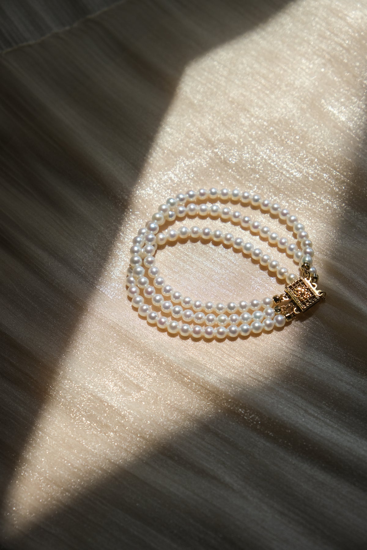 Aurora Filigree Box Clasp Triple-Strand Bracelet